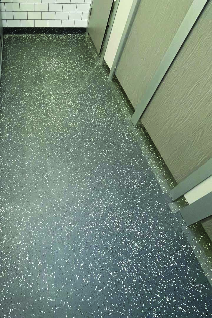 Washroom refurbishment — full waterproofing, high-performance tiling, modern sanitaryware and touch-free fixtures for hygiene and long-term durability.