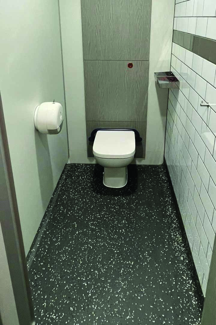 Washroom refurbishment — full waterproofing, high-performance tiling, modern sanitaryware and touch-free fixtures for hygiene and long-term durability.
