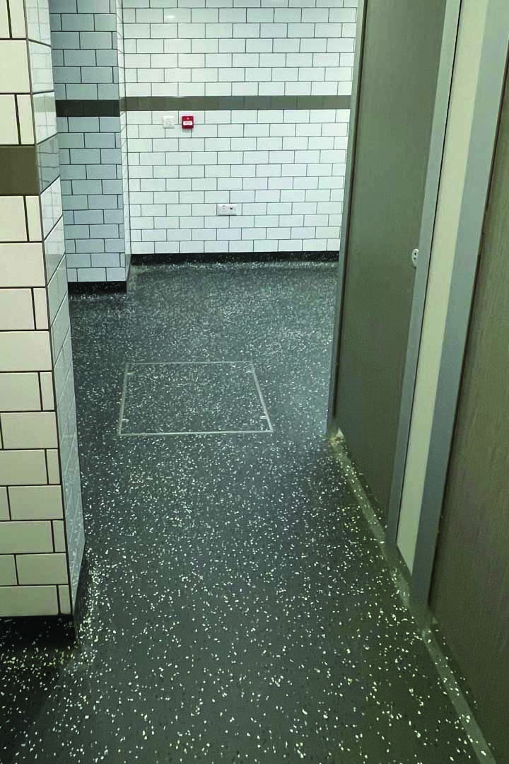Washroom refurbishment — full waterproofing, high-performance tiling, modern sanitaryware and touch-free fixtures for hygiene and long-term durability.
