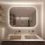 Microcement bathroom walls in Kerakoll Wallcrete WR01 behind twin stone basins and backlit mirror, Kensington