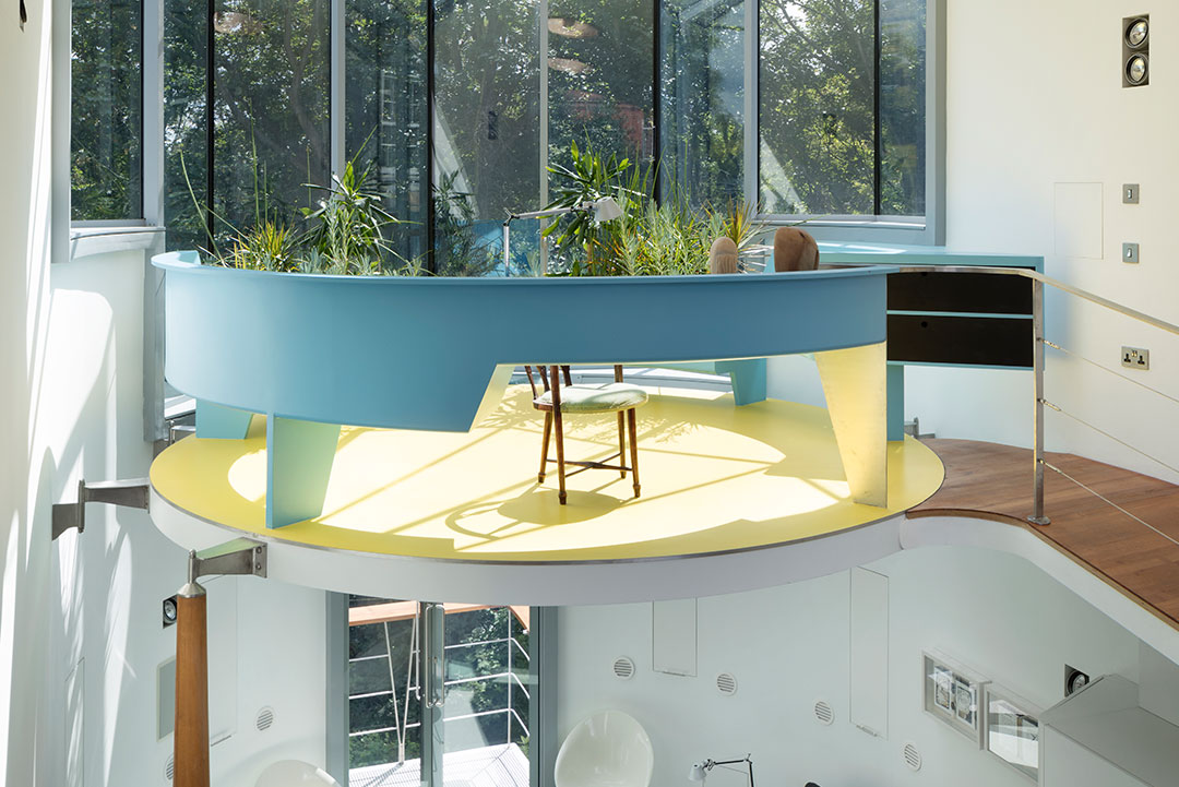 Double-height living space beneath the winter garden at 6 Wood Lane, Highgate